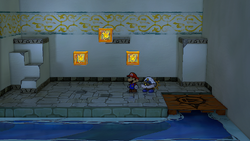 Mario next to the Shine Sprite in the secret room to the very right of Rogueport Underground in the remake of the Paper Mario: The Thousand-Year Door for the Nintendo Switch.