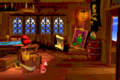 Diddy in a cabin with a Red Balloon and K. Rool's letter