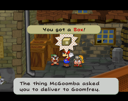 Mario getting the Box from McGoomba in Rogueport of Paper Mario: The Thousand-Year Door.