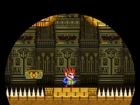 Sparky Wario inside a dark room in Poobah the Pharaoh's Pyramid from Wario: Master of Disguise.