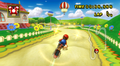 Mario performing a trick on the bumpy road.