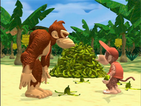 Donkey Kong and Diddy Kong standing by a pile of green bananas in "Watch the Skies"