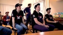 Perry-David, Rik, and several members of the Paris development team watching Mozsi play the game[1]