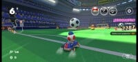 Toad (Tourist) at Madrid Drive circuit in a multiplayer race in Mario Kart Tour.