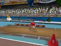 Mario landing on the ground in Long Jump.