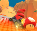 The icon of the Shy Guy Cup challenge from the Valentine's Tour and the Baby Peach Cup challenge from the Frost Tour in Mario Kart Tour.