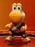 Image of Yoshi in an orange uniform, from Mario Strikers: Battle League