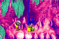 Dixie Kong holding a Steel Barrel at the Koin of Floodlit Fish in the Game Boy Advance version of Donkey Kong Country 3