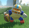 A Passin' Chuck kicking gridiron footballs towards the track