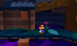 Mario near a bush containing a Heart in Tree Branch Trail of Paper Mario: Sticker Star.