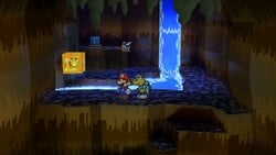 Screenshot of Mario at a hidden ? Block location in Pirate's Grotto, in Paper Mario: The Thousand-Year Door.