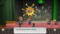 A Black Shy Guy stagehand carries Goombella offstage as Earth Tremor is used.
