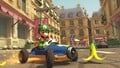 Luigi and Bowser racing on the course
