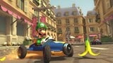 Luigi and Bowser racing on Tour Paris Promenade