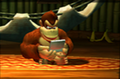 Donkey Kong playing with a Nintendo DS