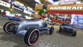 Luigi and Mario driving a W 25 Silver Arrow and GLA respectively