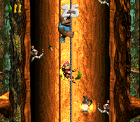 Kiddy Kong and Dixie Kong climb up a rope in the second Bonus Level of Barrel Shield Bust-Up