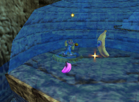 A purple Banana Bunch and a Golden Banana for Tiny Kong in Crystal Caves.