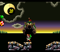 Yoshi fighting the gigantic version of Baby Bowser in the level King Bowser's Castle in Super Mario World 2: Yoshi's Island