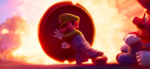 Luigi using a manhole cover to shield himself and Mario against Bowser's fire breath