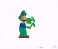 Unused animation cel of Luigi holding Baby Yoshi. (Luigi is seen burnt in this cel; it is unknown what he fed Baby Yoshi, though it is possible it was a fire-based object that Yoshi spat up and hit Luigi.)