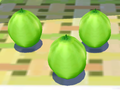 A screenshot of three coconuts from Super Mario Sunshine