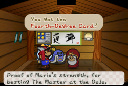 Mario receiveing a Fourth-Degree Card from Master in Toad Town of Paper Mario.