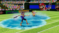 Waluigi and Wario slipping over an ice patch created by an Ice Racket. From Mario Tennis Fever