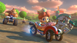 Baby Daisy in Moo Moo Meadows, with Donkey Kong behind her, in Mario Kart 8
