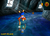 Lanky Kong using OrangStand Sprint to race a beetle in the game Donkey Kong 64.