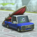 A truck carrying a surfboard in Mario Kart World