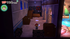 Mario standing near three crates with two of them containing a Coin and a 10-Coin in Shroom City of The Origami King.