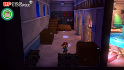 Mario standing near three crates with two of them containing a Coin and a 10-Coin in Shroom City of The Origami King.