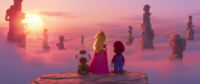 Wide shot of Mario, Peach, and Toad in the cloudy mountain area.