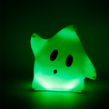 Green Luma popcorn bucket as shown glowing in the dark