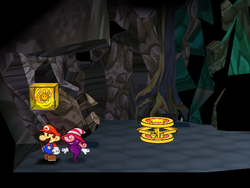 Mario next to the Shine Sprite down the pipe outside Creepy Steeple in Paper Mario: The Thousand-Year Door.
