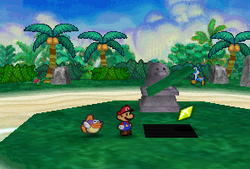 Mario finding a Star Piece under a hidden panel near the Raven staue in Yoshi's Village from Paper Mario