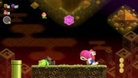 The third 10-flower coin in the The Anglefish Trial: Ready, Aim, Fly! level in Super Mario Bros. Wonder