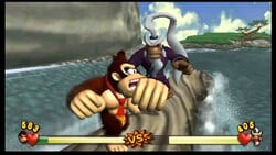 Donkey Kong in a boss fight against Karate Kong in New Play Control! Donkey Kong Jungle Beat