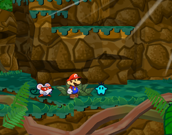 Mario getting a Mini Mr. Mini from a bush in Keelhaul Key of Paper Mario: The Thousand-Year Door.