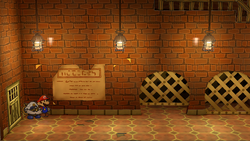 Mario near the poster containing an Ice Storm in Riverside Station of Paper Mario: The Thousand-Year Door for Nintendo Switch.