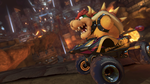 Bowser racing outside of his castle in Mario Kart 8