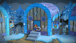 Mario near the Inn Coupon in Fahr Outpost of Paper Mario: The Thousand-Year Door for Nintendo Switch.