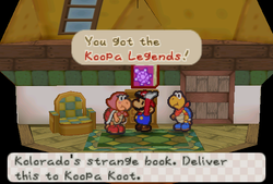 Mario receiveing Koopa Legends from Kolorado's wife in Koopa Village of Paper Mario.