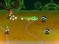 Mario and Luigi using the Green Shell Bros. Attack on two Elite Goombules