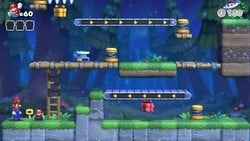 Screenshot of Mystic Forest Plus level 7-2+ from the Nintendo Switch version of Mario vs. Donkey Kong