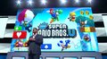 Reggie promoting New Super Mario Bros. U