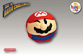 A figurine of Mario winking in his ball form from Mario Pinball Land