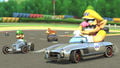 Several characters driving karts from the DLC pack
