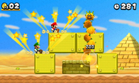 Mario and Luigi defeat a Pokey with their Synchro Ground Pound move in New Super Mario Bros. 2
